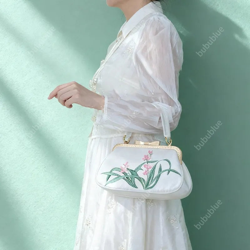 Vintage Orchid Embroidered Handbag with Metal Butterfly Lock - Image 12