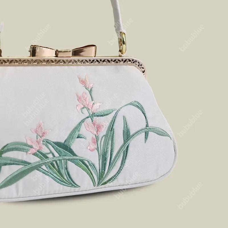 Vintage Orchid Embroidered Handbag with Metal Butterfly Lock - Image 6