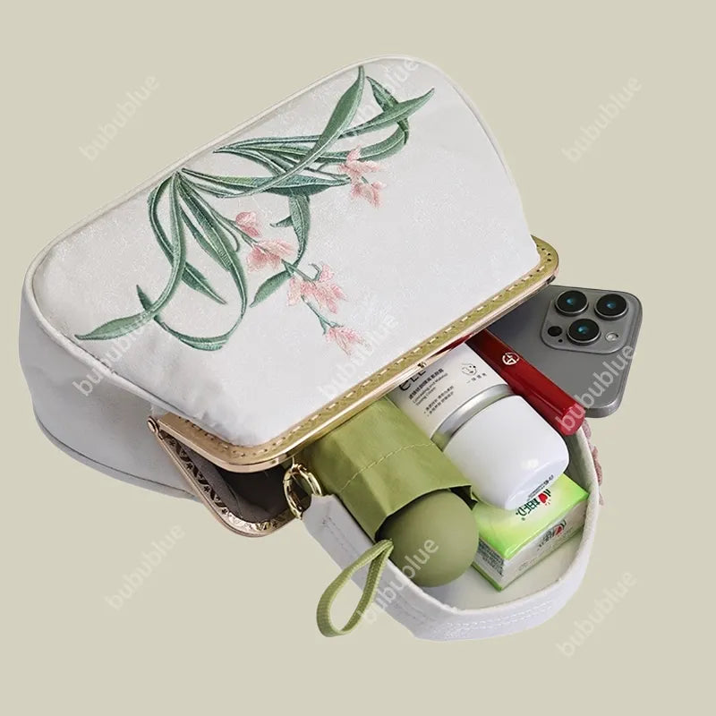 Vintage Orchid Embroidered Handbag with Metal Butterfly Lock - Image 8