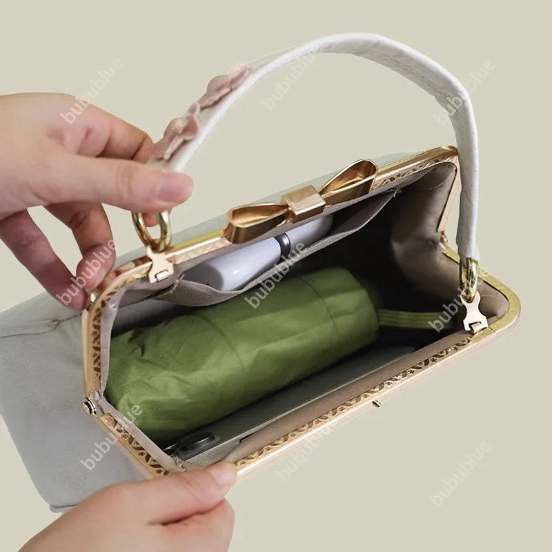 Vintage Orchid Embroidered Handbag with Metal Butterfly Lock - Image 9